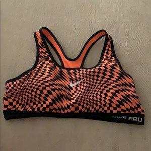 Oran and back Nike pro sports bra